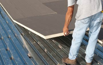 benefits of insulating Magheralin flat roofing